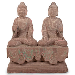 Appraisal: Two Chinese Carved Stone Seated Figures on a Rectangular Base