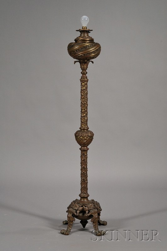 Appraisal: Late Victorian Bronze Floor Lamp early th century glass globe