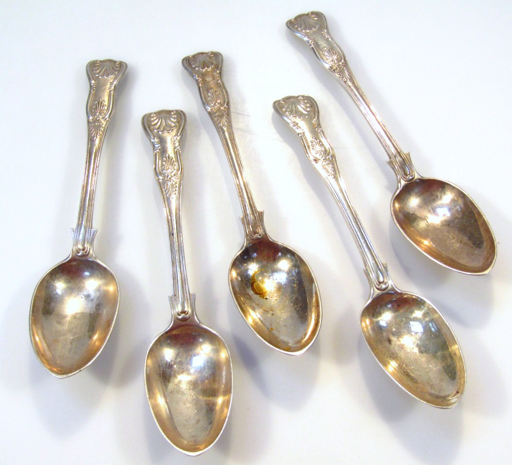 Appraisal: A set of five Victorian silver tablespoons of shell capped