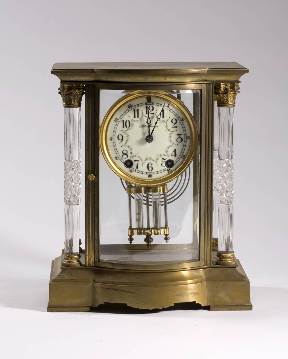 Appraisal: BRASS AND GLASS CASED MANTEL CLOCK WITH FREE STANDING CUT