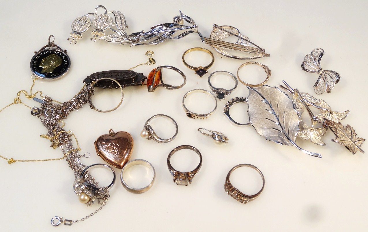 Appraisal: Various rings brooches etc white metal a silver dress ring