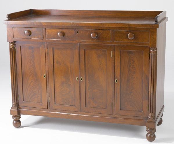 Appraisal: EMPIRE SERVER In flame grain mahogany with gallery top turned