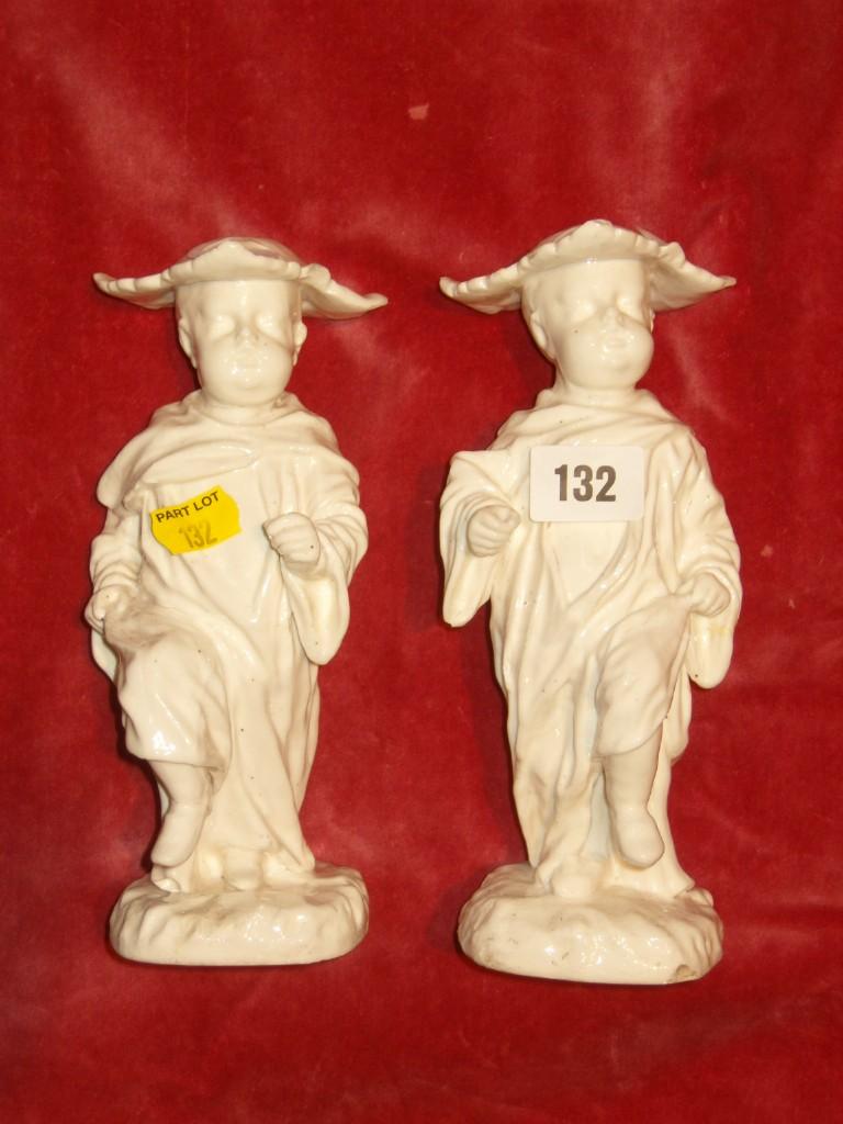 Appraisal: A pair of th century continental white glazed figures of