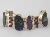 Appraisal: A white metal tests silver boulder opal and stone set