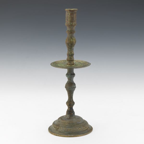 Appraisal: OTTOMAN EMPIRE PATINATED CAST BRONZE TEMPLE CANDLESTICK Heavy cast three-part