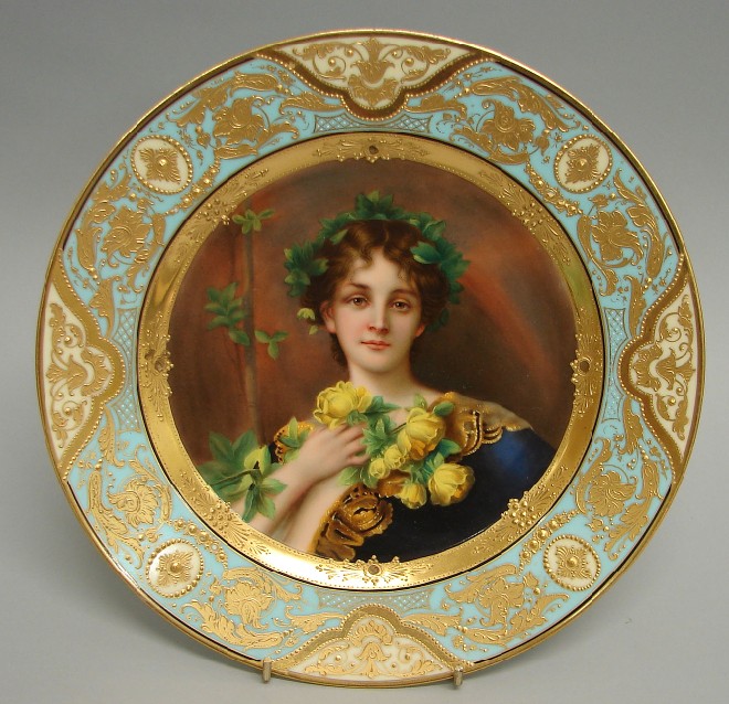 Appraisal: Plate titled verso Neilrose features handpainted classical woman holding yellow