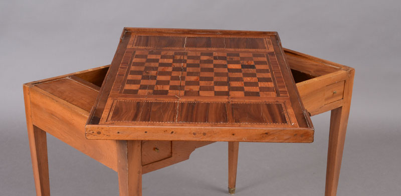 Appraisal: LOUIS XVI WALNUT AND FRUITWOOD PARQUETRY TRIC TRAC TABLE The