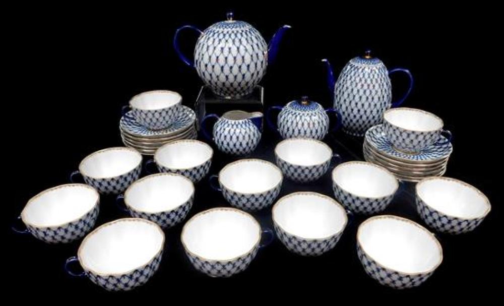 Appraisal: Russian tea set blue and white porcelain with gilt accents