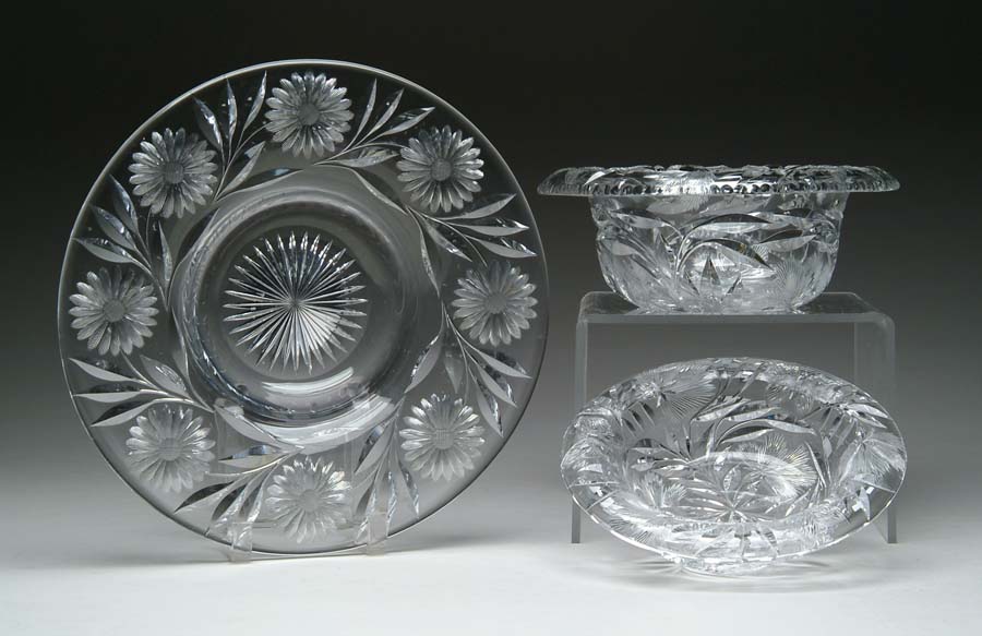 Appraisal: THREE CUT GLASS BOWLS Lot consists of two bowls cut