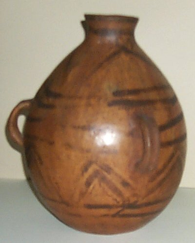 Appraisal: Large Mexican clay water jug with three handles glazed ceramic