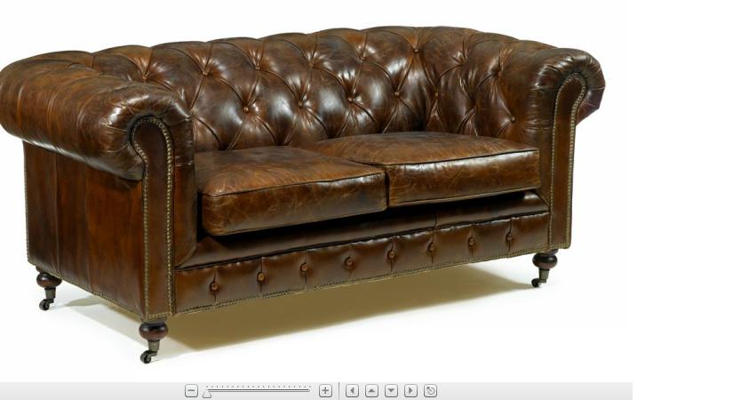 Appraisal: Pair of Victorian style brown lea the r chesterfield sofas