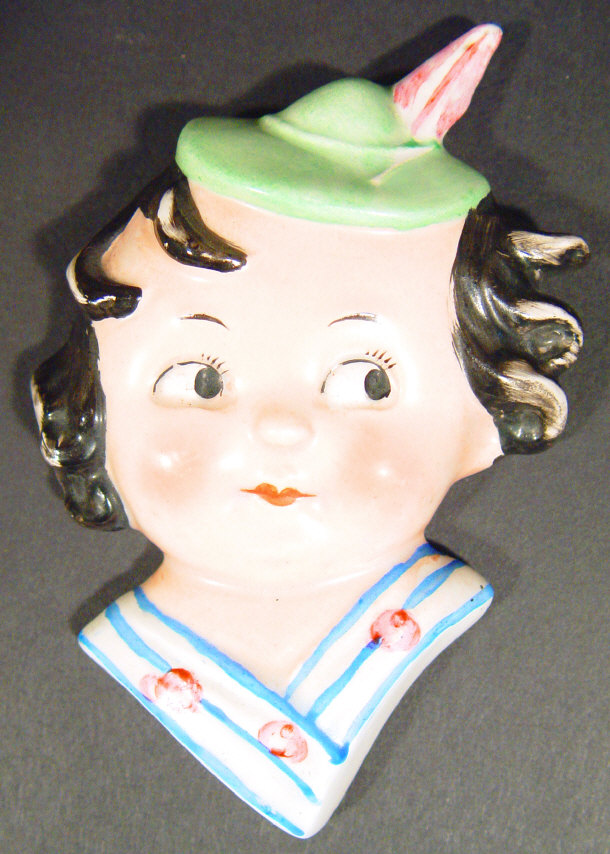 Appraisal: Goebels china wall mask modelled as a young child with