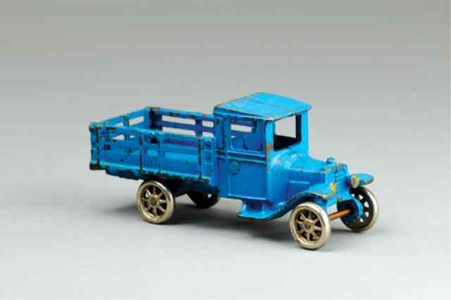 Appraisal: ARCADE MODEL 'T' STAKE TRUCK Cast iron painted in blue