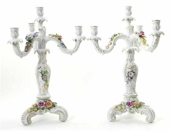 Appraisal: Pair Continental porcelain candelabra floral-encrusted Rococo design issuing three scrolling