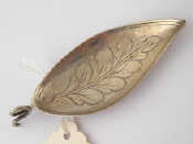 Appraisal: A Georgian silver leaf caddy spoon with engraved veins and