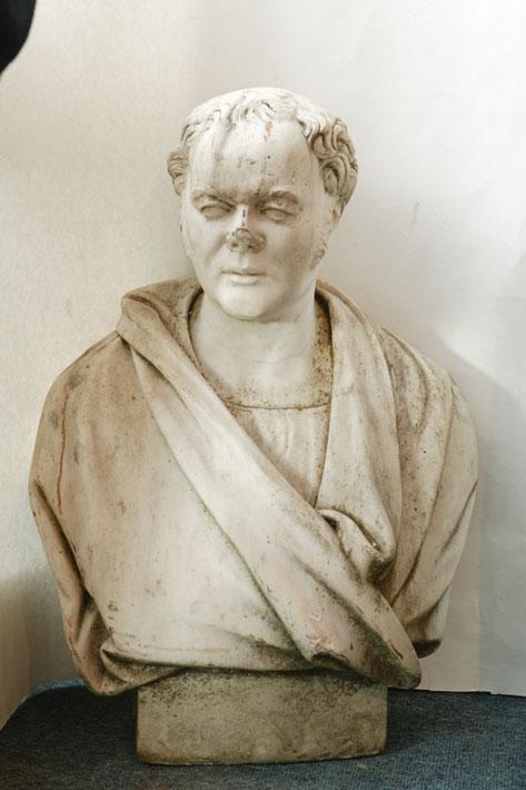 Appraisal: A CARVED LIBRARY BUST OF A GENTLEMAN wearing a loose