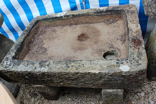 Appraisal: A LARGE OLD STONE RECTANGULAR SINK two block supports cm