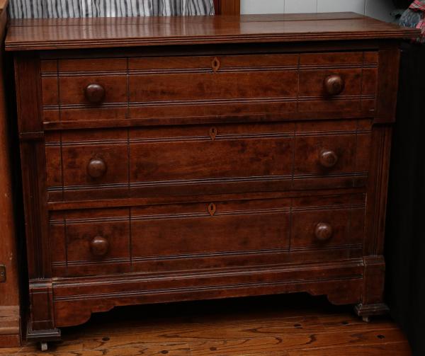 Appraisal: A TH CENTURY AMERICAN THREE DRAWER CHESTThe solid walnut case