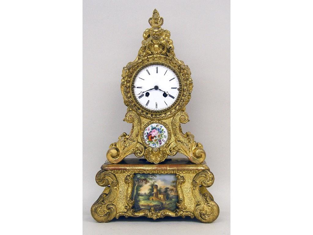 Appraisal: Unusual spelter swinging mystery clock modelled with a boy standing