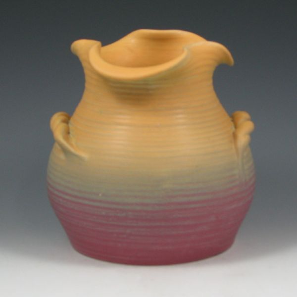 Appraisal: Weller Ansonia vase with rope handles and yellow and pink