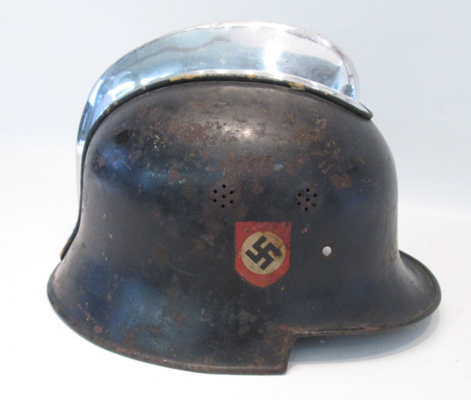 Appraisal: GERMAN WORLD WAR II FIREMAN'S HELMET black helmet with aluminum