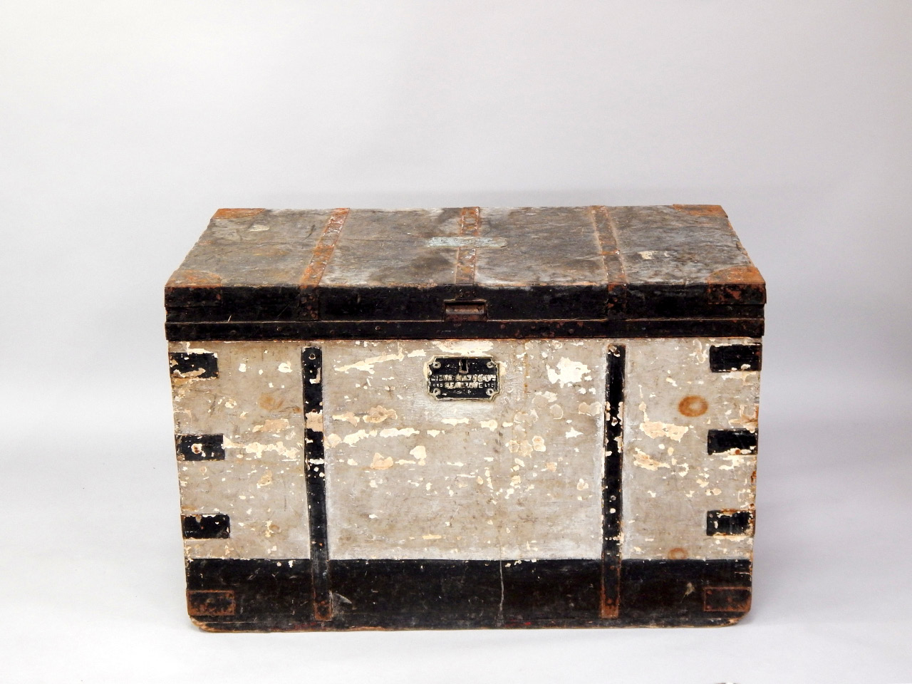 Appraisal: A Victorian painted and metal bound wooden sea chest by