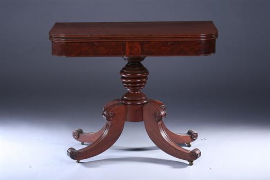 Appraisal: EMPIRE MAHOGANY FLIP-TOP CONSOLE GAME TABLE th century Channel-edge rounded-corner