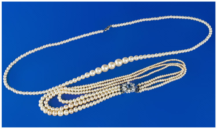 Appraisal: Two Faux Pearl Necklaces with Simulated Sapphire and Diamond Clasp