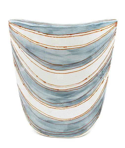 Appraisal: A Continental glazed ceramic vase together with a tall wood