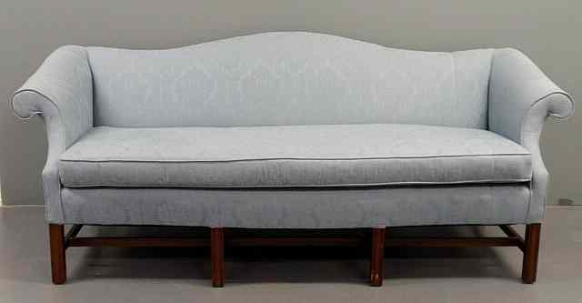 Appraisal: Chippendale style mahogany camelback sofa with blue upholstery h x