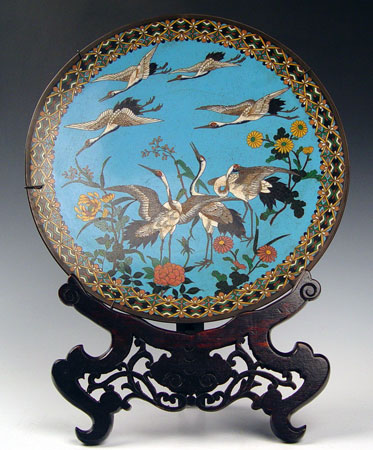 Appraisal: FLYING CRANE CLOISONNE CHARGER Blue ground with flying cranes geometric