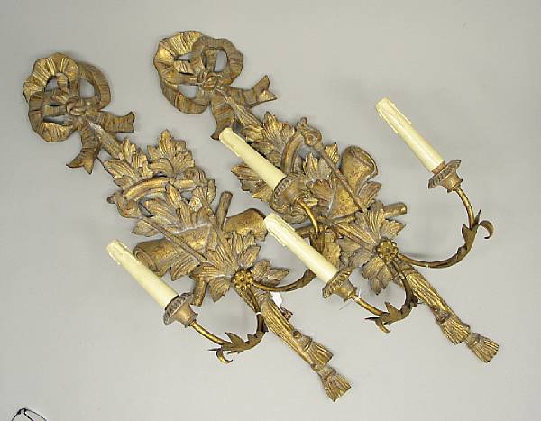 Appraisal: A pair of Neoclassical style giltwood wall lights second half