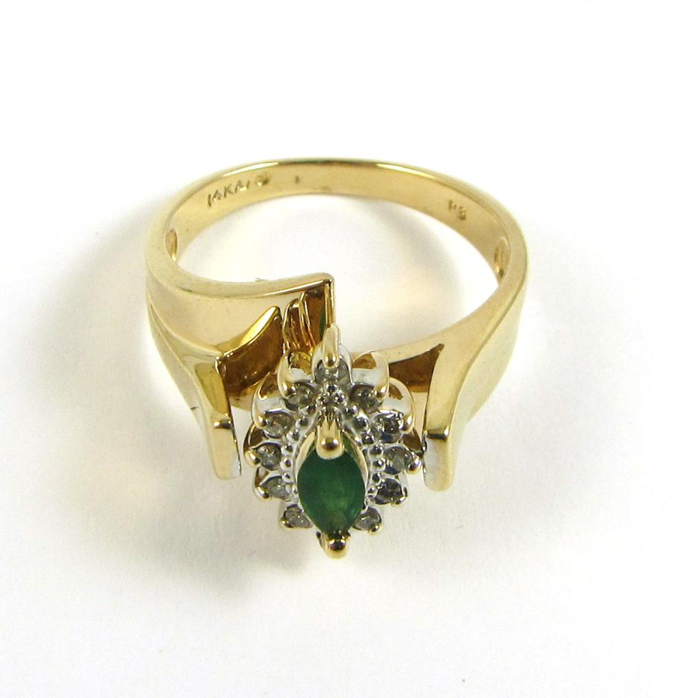 Appraisal: EMERALD DIAMOND AND FOURTEEN KARAT GOLD RING with twelve round-cut