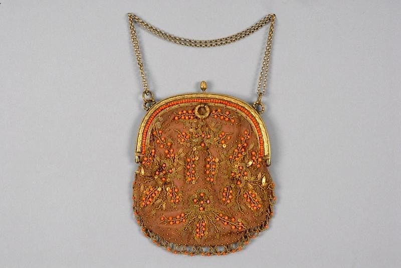 Appraisal: CORAL BEADED BAG LATE th C Curved gilt metal hinged