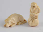 Appraisal: Two netsuke circa one a monkey in a sack its