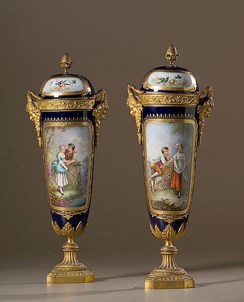 Appraisal: SEVRES-STYLE PORCELAIN URNS French late th century A pair each