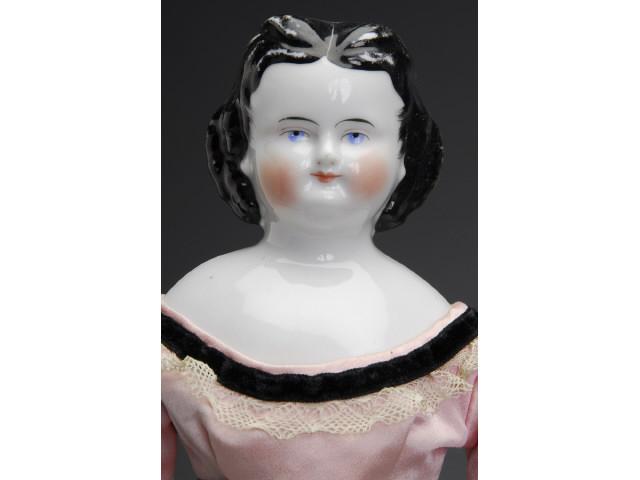 Appraisal: China Lady with Brush-Stroked Spit Curls Germany ca glazed porcelain