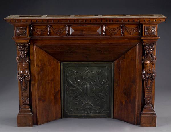 Appraisal: A Renaissance Revival walnut fireplace surround second quarter th century