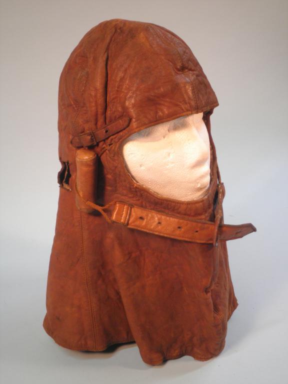 Appraisal: A vintage motorist's or aviator's adjustable leather balaclava