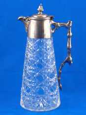 Appraisal: A silver plate mounted hobnail cut glass claret jug the