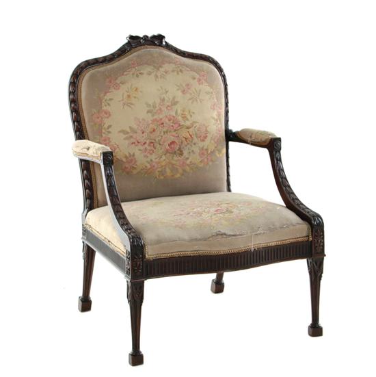 Appraisal: Sheraton style carved mahogany library armchair late th early th