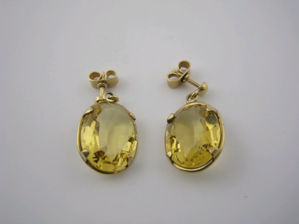 Appraisal: Pair of Citrine Ear Pendants each with large oval-cut stone