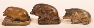 Appraisal: Three Various Cast Metal Pig Paperweights Two cast iron one