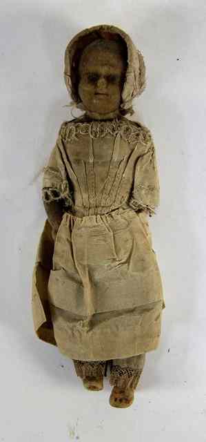 Appraisal: A th century wax head doll in a contemporary lace