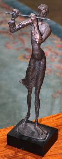 Appraisal: Patinated bronze figural sculpture Patinated bronze figural sculpture depicting a