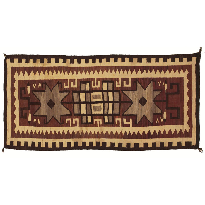 Appraisal: Navajo rug geometric and floral designs in browns on a