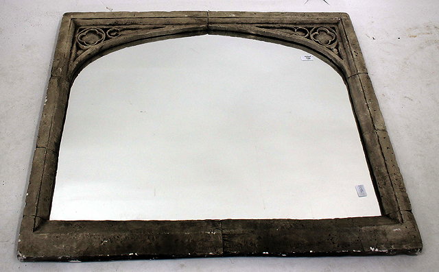 Appraisal: A BRIGHTON ROCS HANDCRAFTED COMPOSITION WALL MIRROR in gothic style