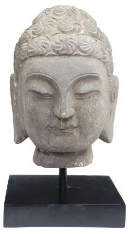 Appraisal: Carved stone sculpture head of the Buddha rising on square