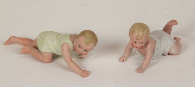 Appraisal: Two German bisque Piano Baby models a child crawling cm