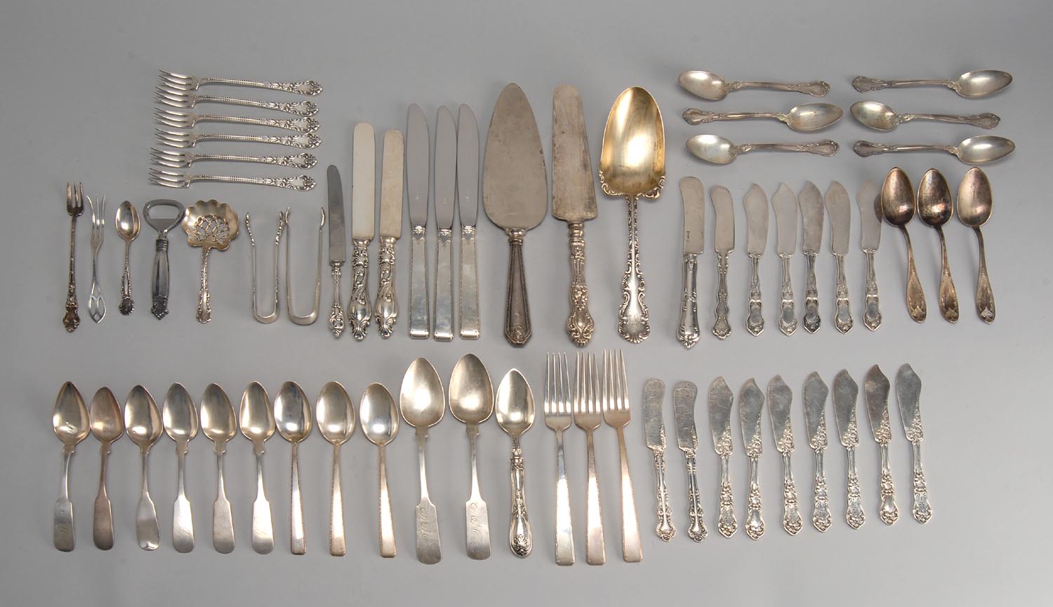 Appraisal: SIXTY-FOUR PIECES OF STERLING SILVER AND SILVER PLATED FLATWARE by